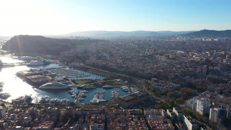 Mega-yacht-in-Port-of-Barcelona-aerial-sunny-day-Spain-Barceloneta-neighbourhood